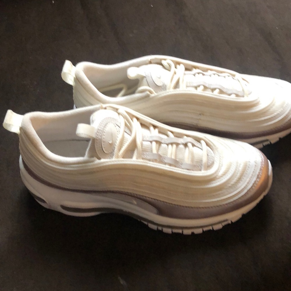 Nike’s white and Rose Gold. Only wore one time